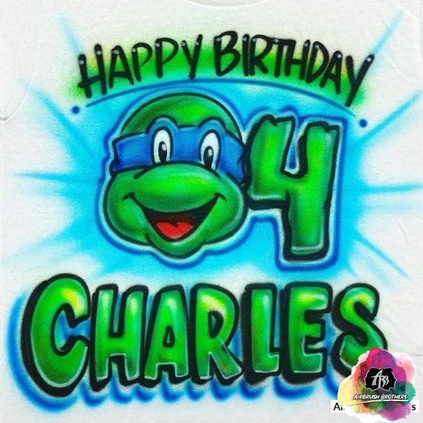 http://airbrushbrothers.com/cdn/shop/products/airbrush-airbrush-ninja-turtle-birthday-design-airbrush-brothers-shirt-custom-spray-paint-design-shirt-hat-shoes-outfit-graffiti-t-shirts-birthday-90s-80s-15295770165326_grande.jpg?v=1687538608